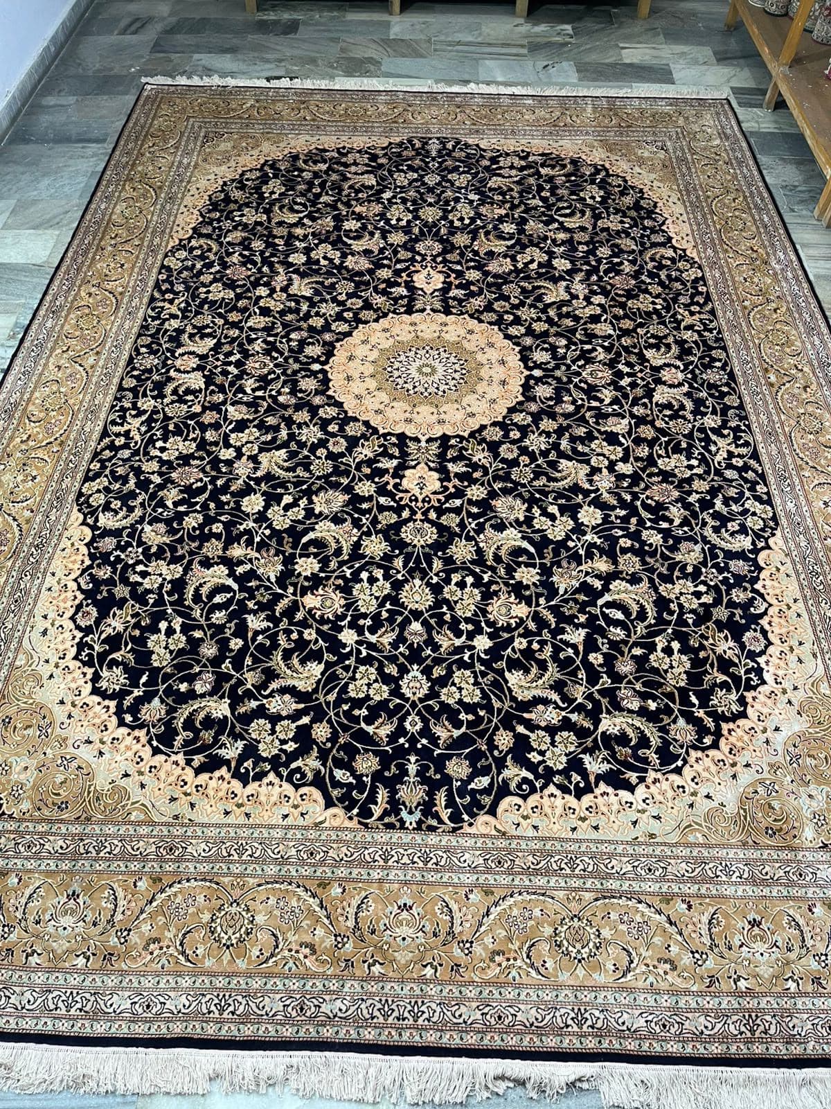 Navy silk rug with gold border