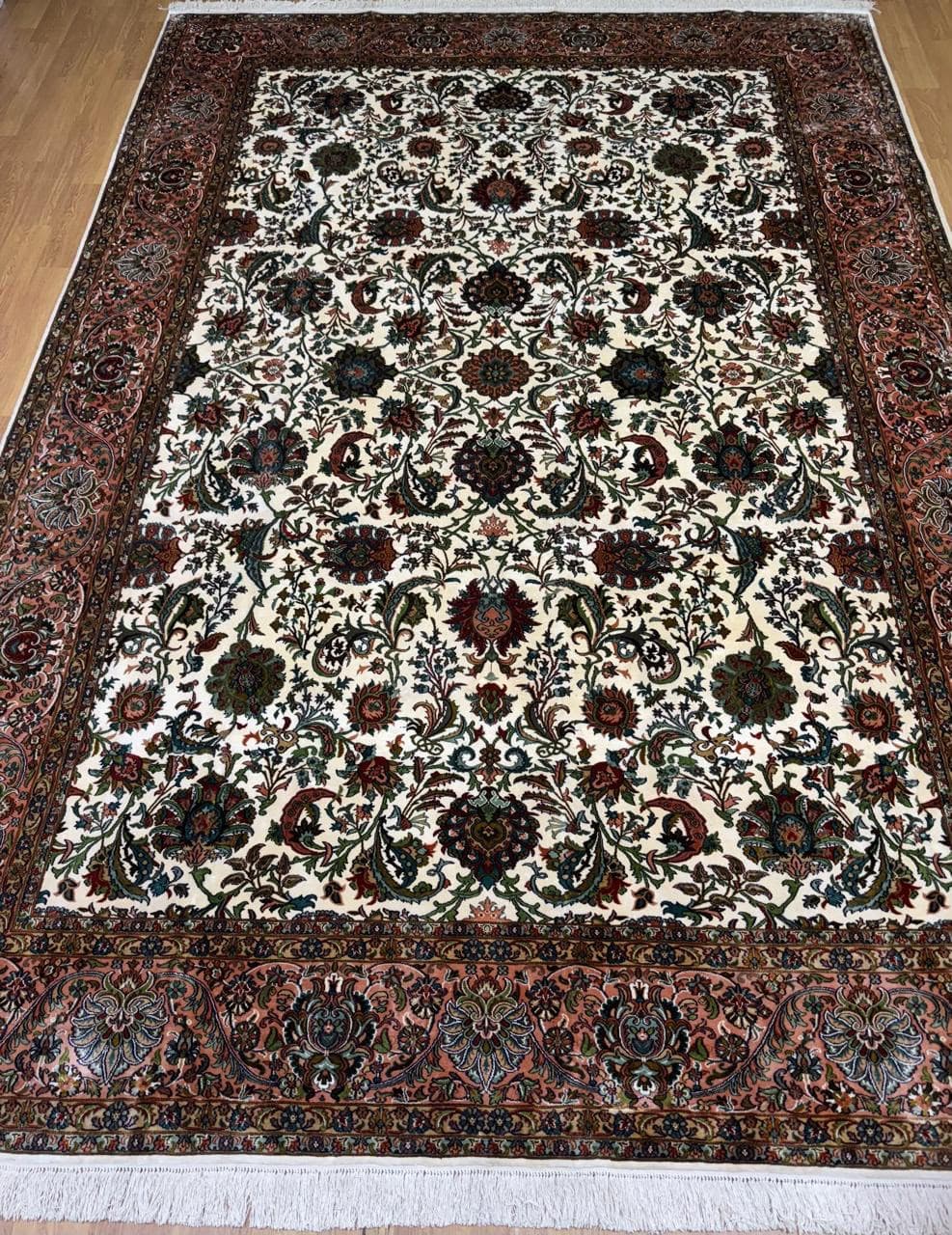 Ivory floral silk rug with rose border
